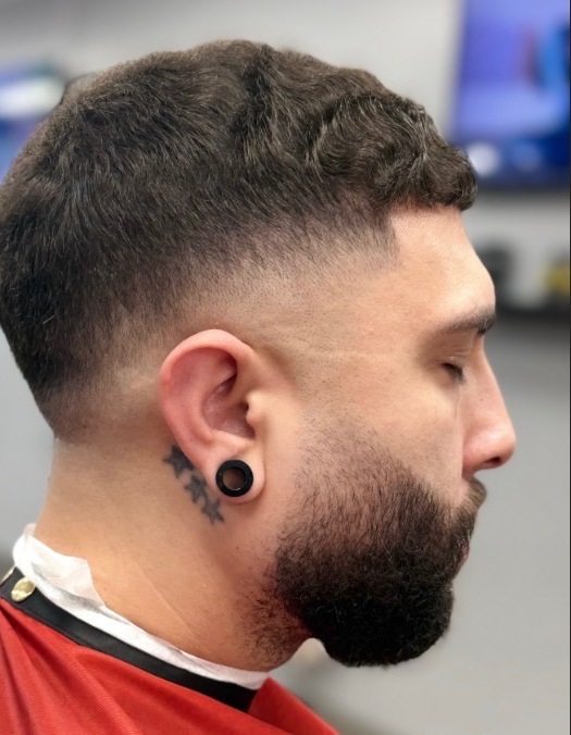Side profile mid fade with beard — X Express Barbershop